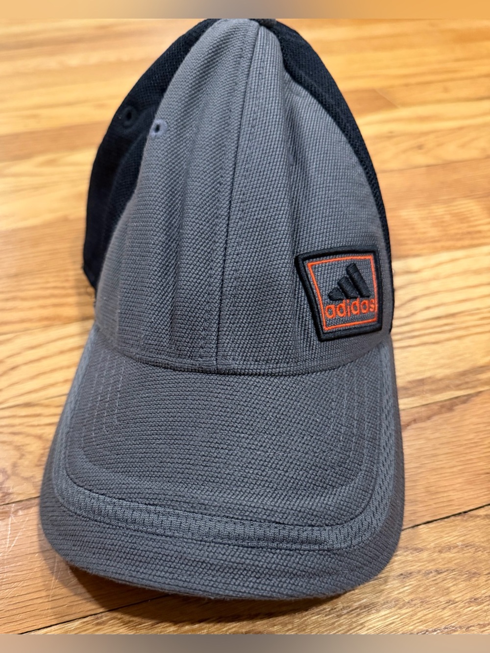 Adidas Gray and Black Cap with Orange Logo Patch